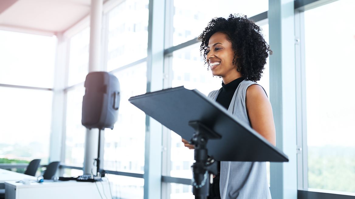 businesswoman-speaking-at-event